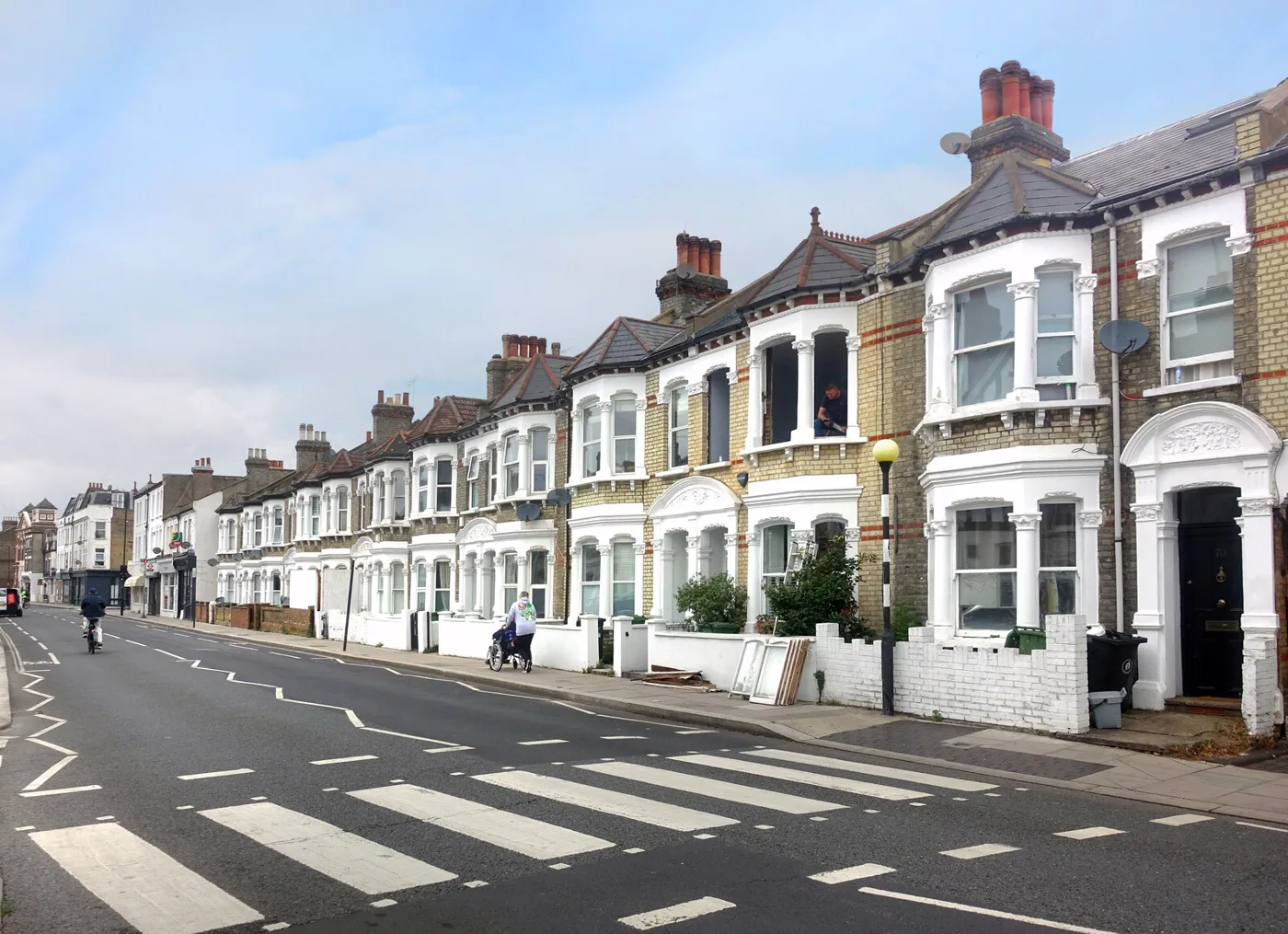 Terraced houses on Dawes Road, Fulham. Rubbish, recycling and food waste are all collected here every week, on the same day